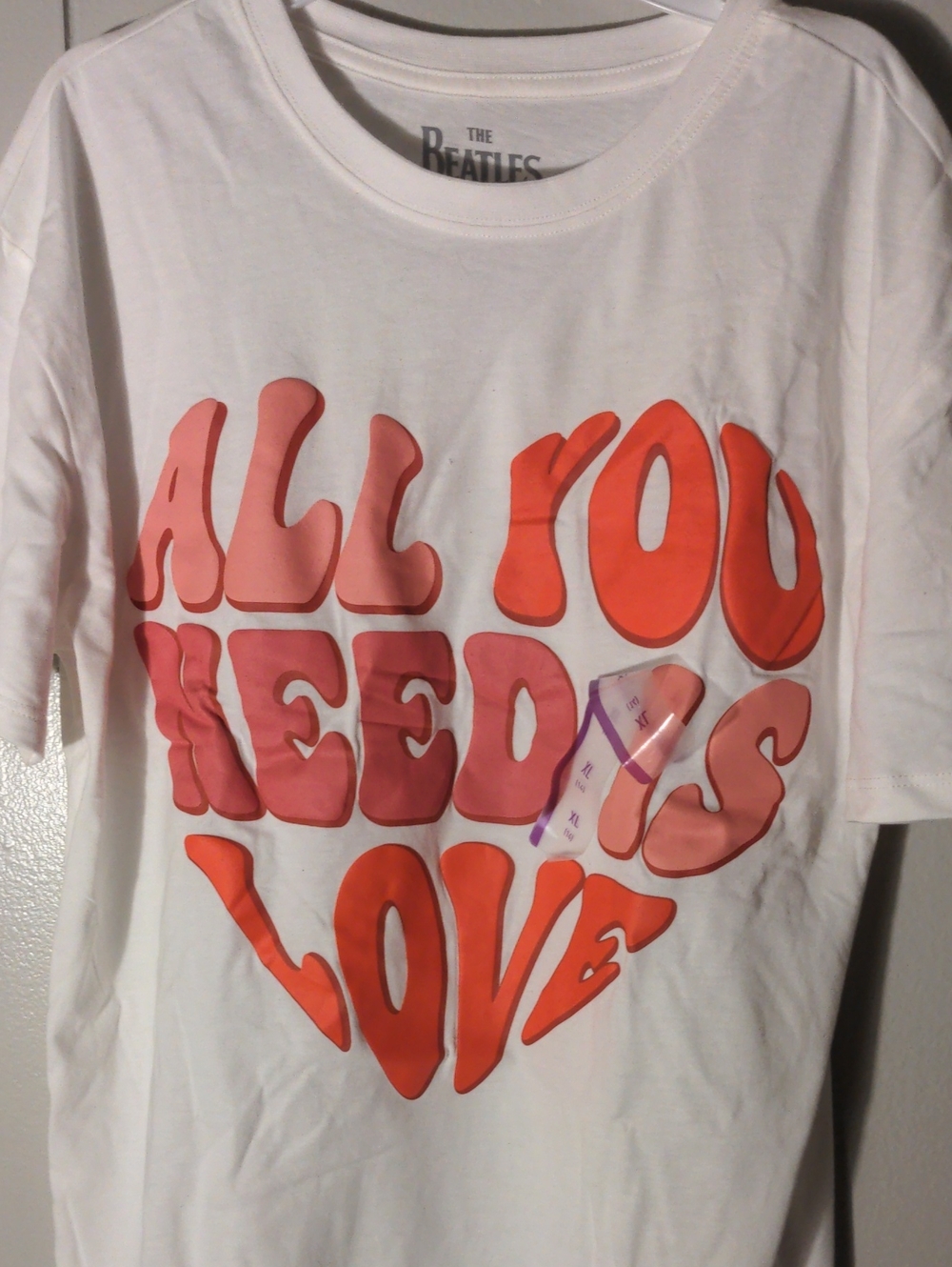 The Beatles White Tee with Pink and Orange 'All You Need Is Love' Heart Graphic